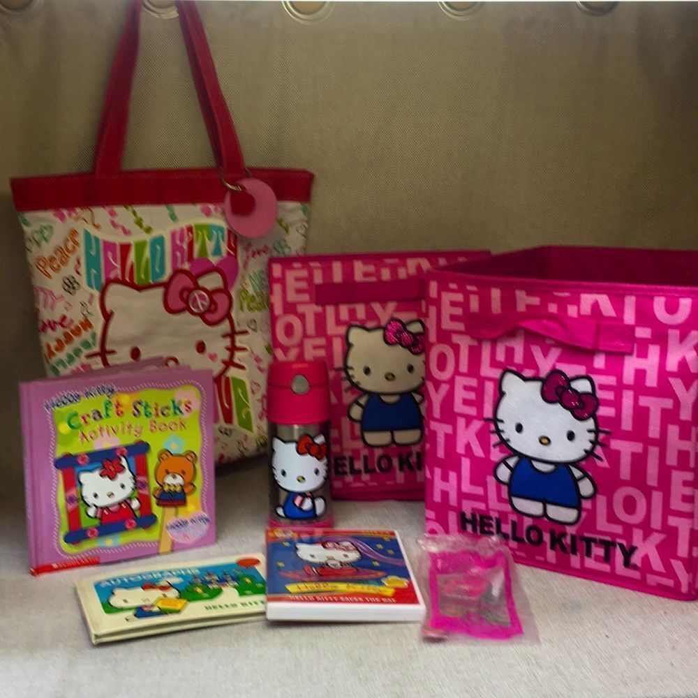 Hello Kitty totes, bag, books, dvd and thermos‎